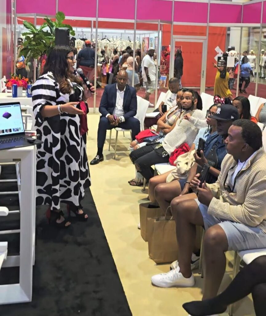 Alicia Lyttle leads one of her AI workshops for entrepreneurs in a community setting, engaging a diverse audience with practical business strategies.