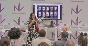 Alicia Lyttle leads one of the featured AI workshops for entrepreneurs at the ESSENCE Festival, showing real tools to a live audience.